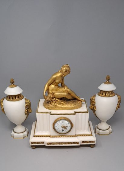 null After FALCONET
Louis XVI style marble and gilded bronze mantel set composed...