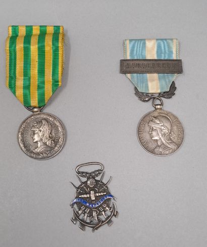 Three military medals :
- silver medal of...