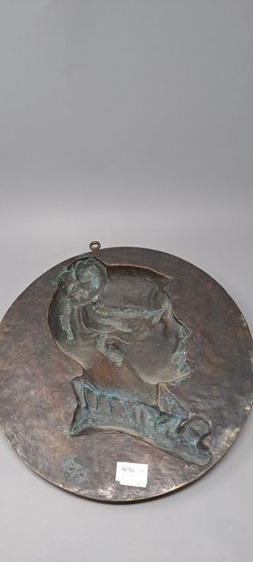 null E.J. DEVAULX
Pair of bronze medallions representing portraits of man and woman...