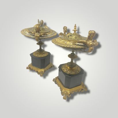 Pair of gilt bronze and black marble cassolettes...