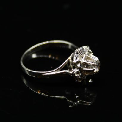 null Dome ring in 18k (750) white gold set with a diamond and smaller diamonds on...