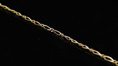Curb in 18k (750) yellow gold with figaro...