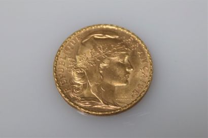 null Gold coin of 20 Francs au Coq (1904)
Weight : 6,46 g.