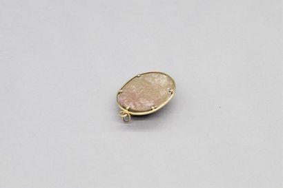 null Oval pendant in 18K (750) yellow gold with a lava stone cameo showing a shepherdess...