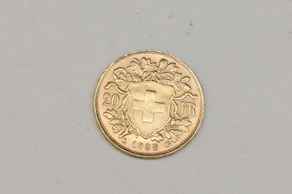 null Gold coin of 20 Swiss Francs (1935). 
Weight : 6.45 g.