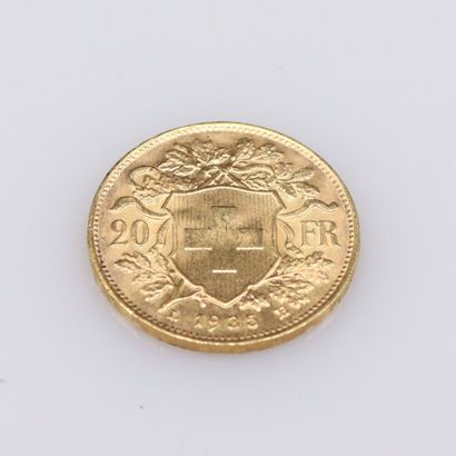 null Gold coin of 20 Francs Helvetia (1935 B).
Weight : 6.45g.