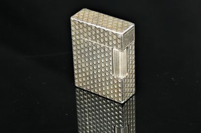 S.T. DUPONT 
Lighter in silver plated metal...