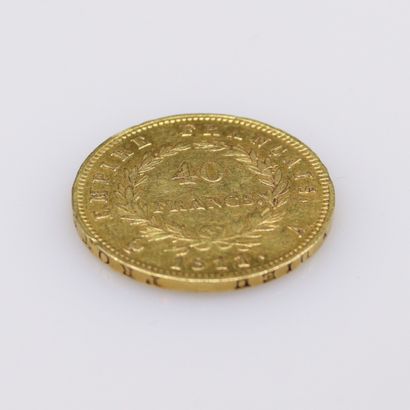 null Gold coin of 40 Francs Napoleon I (1811 A).
Weight : 12.80g.
