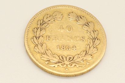 null Gold coin of 40 francs Louis-Philippe (1834 A)
B to TB.
Weight : 12.57 g.