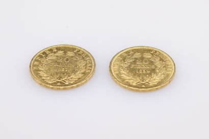 null Lot de deux pièces en or de 20 francs Napoléon III tête nue (1857; 1859), Paris.
Poids...