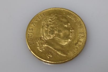 null Gold coin of 40 Francs Louis XVIII (1818 W)
Weight : 12,92 g.