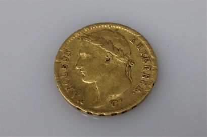null Gold coin of 20 Francs Napoleon I head (1811 A).
Weight : 6.45g.