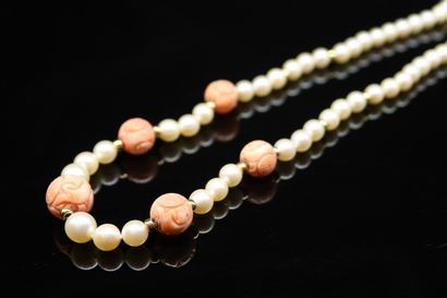 Necklace of cultured pearls, adorned with...