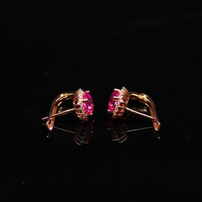null Pair of 925° pink vermeil sleepers each centered with a square pink topaz framed...