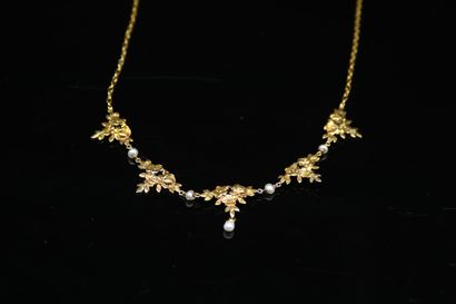 Necklace in 18k (750) yellow gold decorated...
