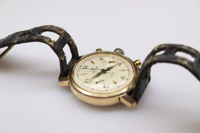 AIRAIN
Chronograph in gilded metal. 
Round...