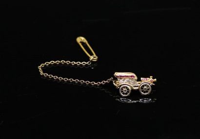 Small brooch in 18k (750) yellow gold and...