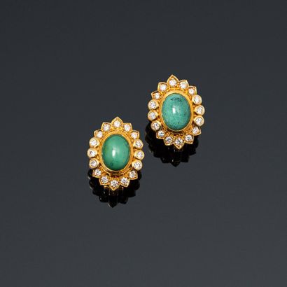 null Pair of ear clips in 18K (750) gold, each set with a green cabochon stone surrounded...