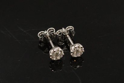 Pair of 18k (750) white gold round stud earrings...