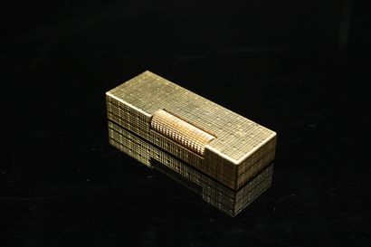 DUNHILL
Lighter in gilded metal with diamond...