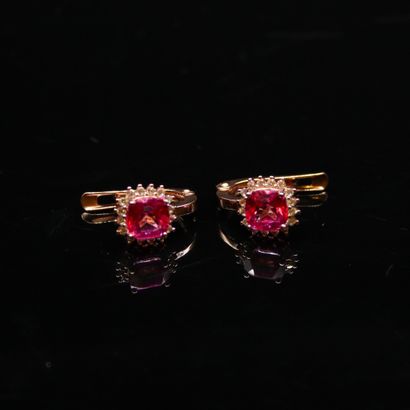 null Pair of 925° pink vermeil sleepers each centered with a square pink topaz framed...