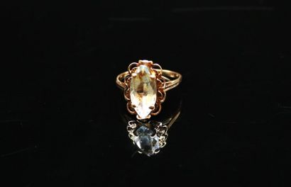 Yellow gold ring set with a marquise aquamarine....