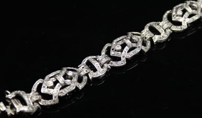null Articulated silver bracelet decorated with small diamonds.
Wrist size : 18 cm...
