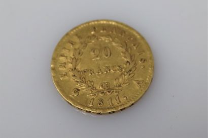 null Pièce en or de 20 Francs Napoléon Ier tête laurée (1811 A).
Poids : 6.45g.