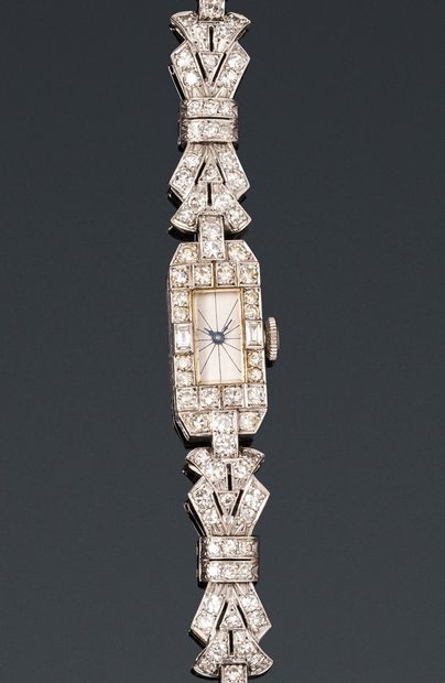 Lady's bracelet watch in platinum. Case set...