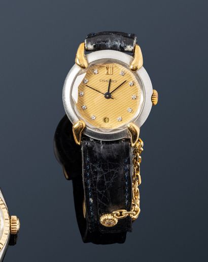 null CHAUMET 
No. 220827
Ladies' wristwatch in steel and 18k (750) gold. Round case...