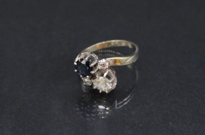 null Toi&Moi ring in 18K (750) white gold set with an old-cut diamond and a sapphire,...