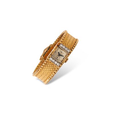 null SUPER-PYL 

Vers 1960

Montre bracelet pour femme en or jaune 18k (750), lunette...
