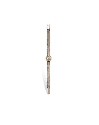 null JAEGER LECOULTRE 

Circa 1960

N° 165640

Ladies' wristwatch in 18k (750) white...