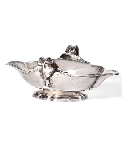 null Oval sauce boat with two silver spouts 

Master goldsmith Jean Deharchies

Paris,...