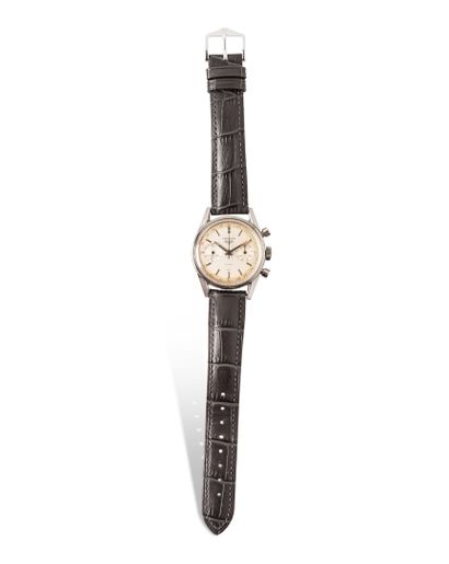 null HEUER CARRERA 

Circa 1960

Men's stainless steel chronograph wristwatch, white...
