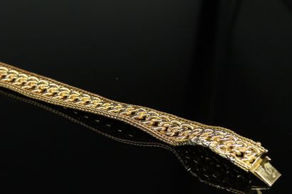 null Bracelet à maille ciselée en or jaune 18k (750).

Tour de poignet : 18.5 cm...