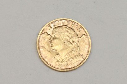 Pièce en or de 20 Francs suisse (1935). 

Poids...