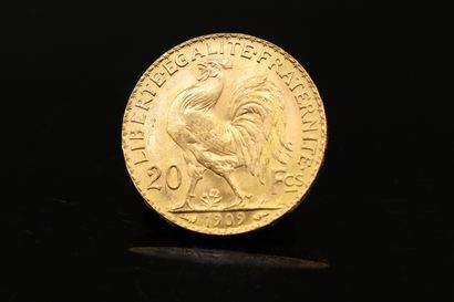 null Gold coin of 20 Francs with rooster (1909)

Weight : 6.45 g.