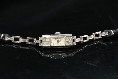 null Montre bracelet de dame en or gris 18k (750), boîtier rectangulaire orné de...