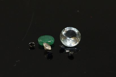 null Ensemble de pierres papier : 

- un diamant d'env. 0.18 ct

- une aigue-marine,...