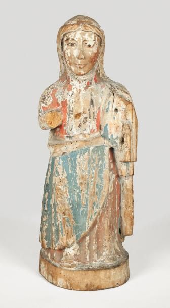 null Vierge à l'enfant en bois sculpté du XVIIe siècle. Elle est représentée debout...