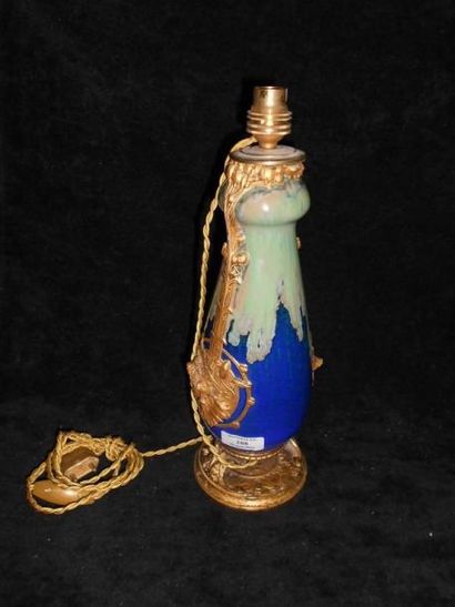 LOUCHET Paul-François (1854 -1936) Vase en porcelaine à décor de glacis bleu et vert,...