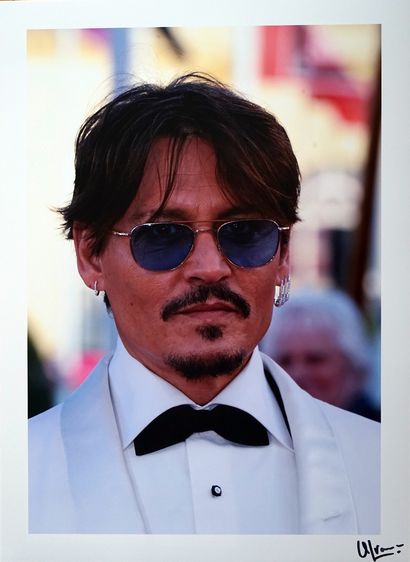 null Johnny Depp Deauville 

tirage sur papier argentique, signé a l'encre noire...