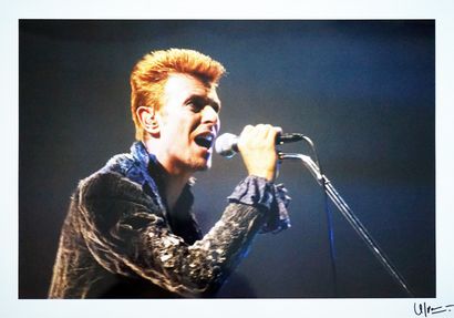 null David Bowie 

tirage sur papier argentique, signé a l'encre noire sous l'image...