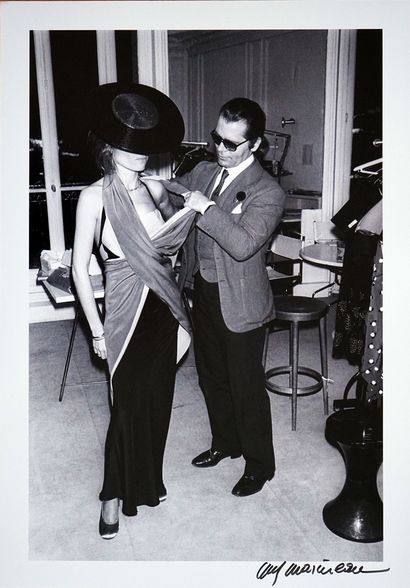 null Karl Lagerfeld fitting 

Print on silver paper, signed and numbered 2/15 by...