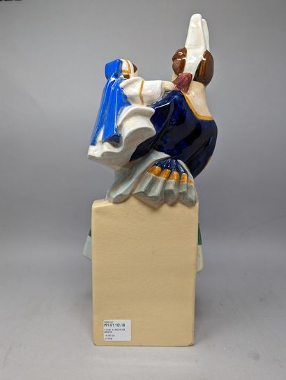 null QUIMPER - MICHEAU-VERNEZ Robert (1907-1989)
Group in polychrome earthenware...