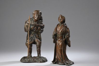 null JAPAN - MEIJI period (1868 - 1912)
Two okimono, one in bronze with brown patina,...
