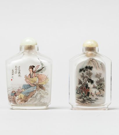 null Two glass snuff bottles painted on the inside, one with two mountain landscapes,...
