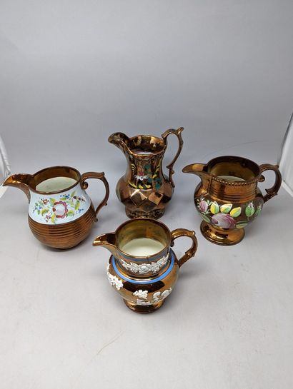 null JERSEY
Collection of earthenware pitchers and jugs with different types of decorations:...