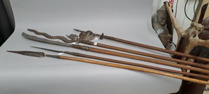 null INDOCHINA - Early 20th century
Set of five wooden ritual halberds, one ending...